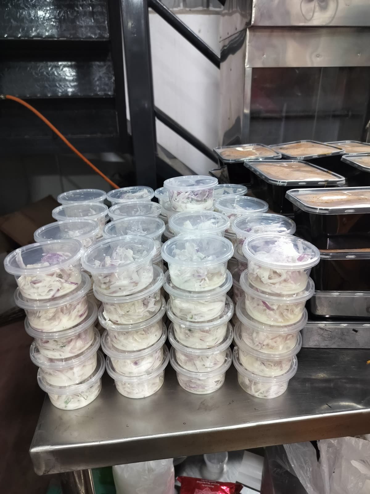 Portioned meals stacked ready for despatch